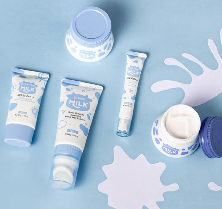 Taviona™ Clinical Milk-Barrier 5-piece skincare system with bottles and applicators for professional skin protection and care