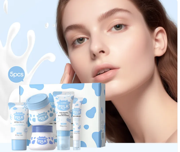 Taviona™ Clinical Milk-Barrier 5-Piece System including bottles, nipples, and accessories on a white background.