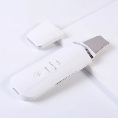 Taviona™ Deep Pore Sonic Scrubber showing a close-up of the handheld skin cleansing device with a textured brush head.